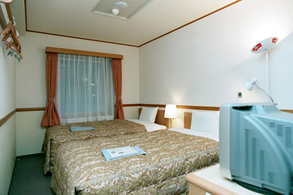 Toyoko Inn Yokohama Minatomirai-Sen Nihon-Odori Ekimae Szoba fotó